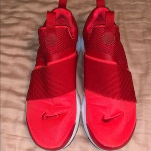 Red and red orange Nike Shoes